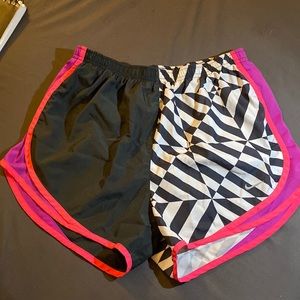 Nike shorts like new does have a small hole at bottom